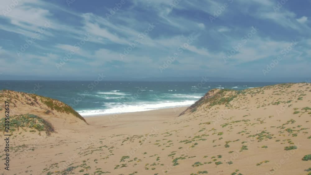 63_View of the beach between two hills 63_View of the beach between two hills