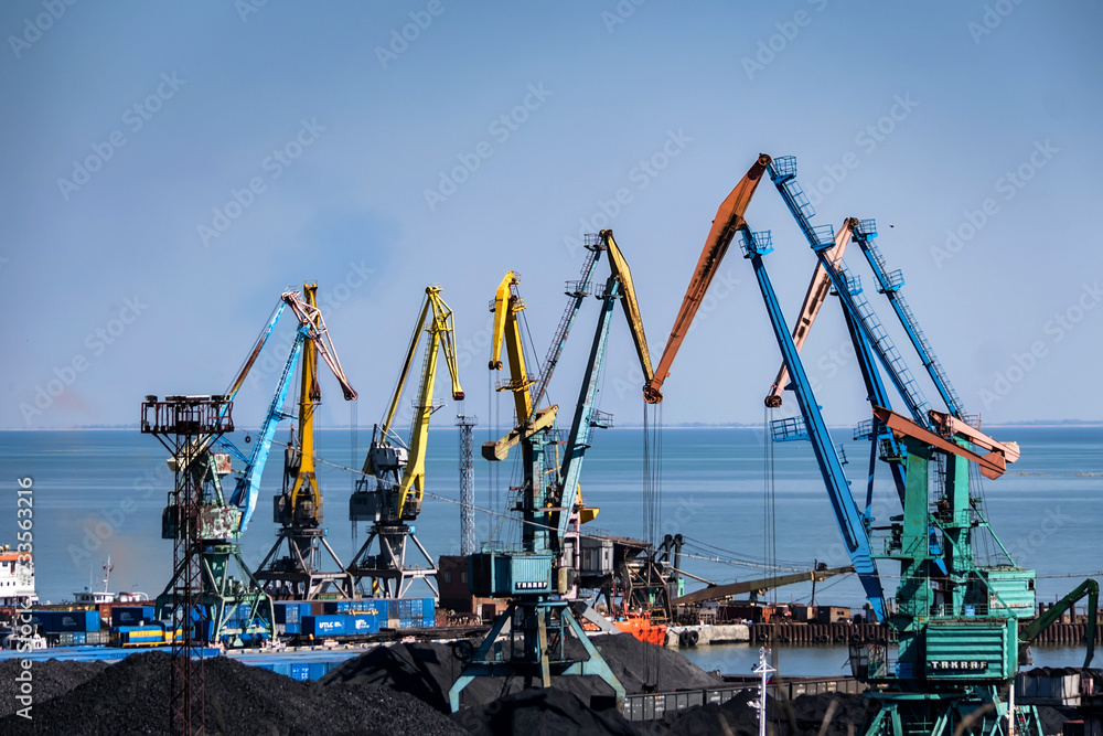 Industrial sea port with many cranes view Industrial sea port with many cranes view