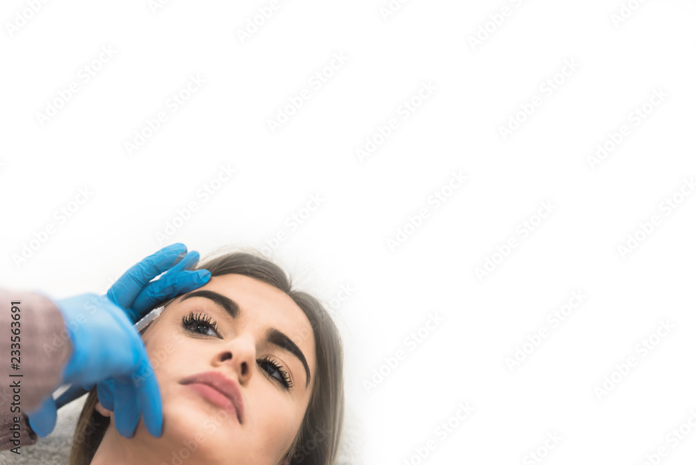 Young woman having eyebrows lifting Young woman having eyebrows lifting
