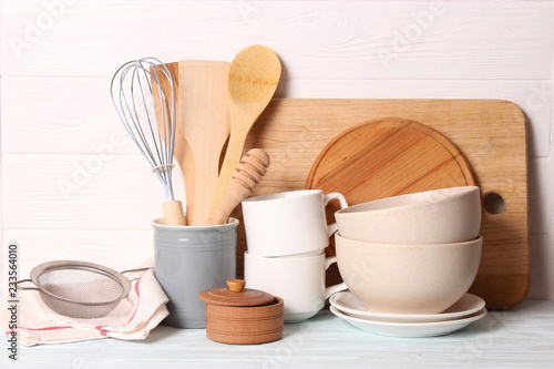 set of kitchenware on wooden background. Cooking appliances.
