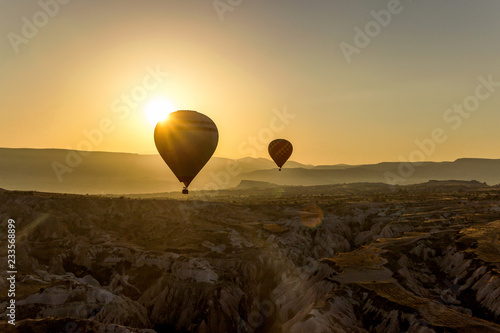 air balloons in sky at sunrise in Cappadocia