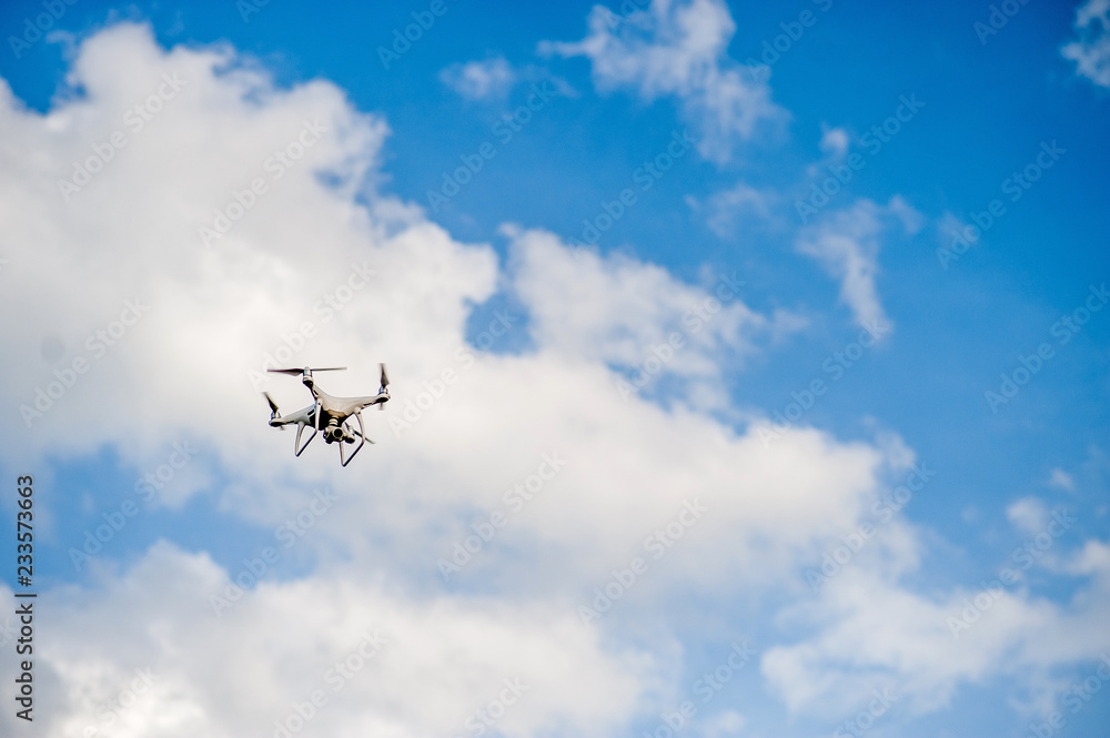 Aerial photography equipment Flying in the blue sky. And copy space Aerial photography equipment Flying in the blue sky. And copy space