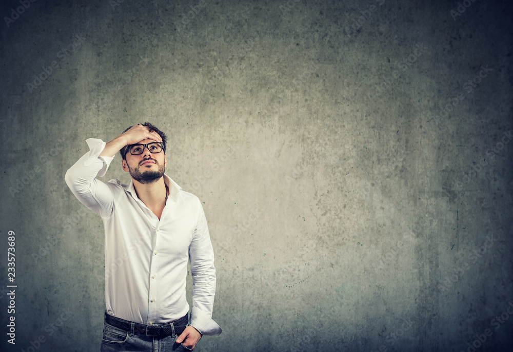 Pensive man looking up in problems Pensive man looking up in problems