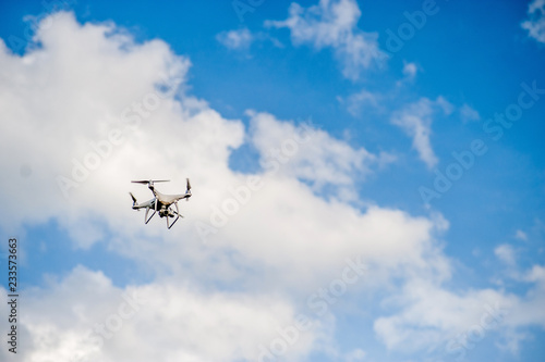 Aerial photography equipment Flying in the blue sky. And copy space