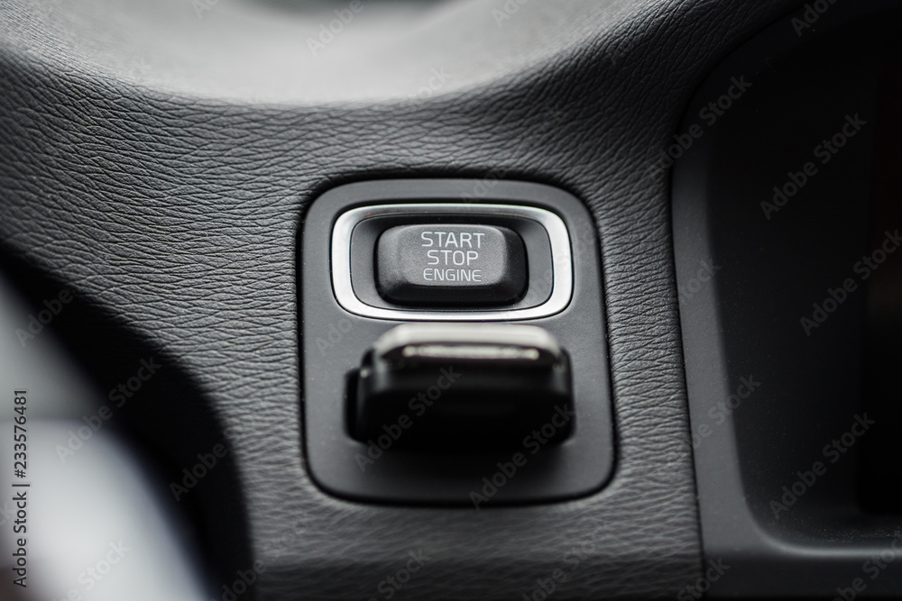 Car start stop button with inserted ignition key