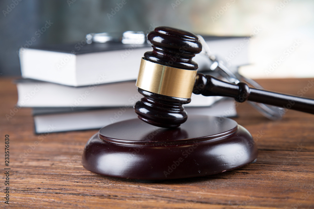 Judge gavel and statuette of justice and book background law Judge gavel and statuette of justice and book background law