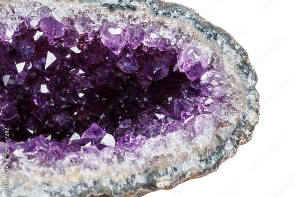 Macro Mineral Stone Amethysts in the rock on a white background - obrazy, fototapety, plakaty 