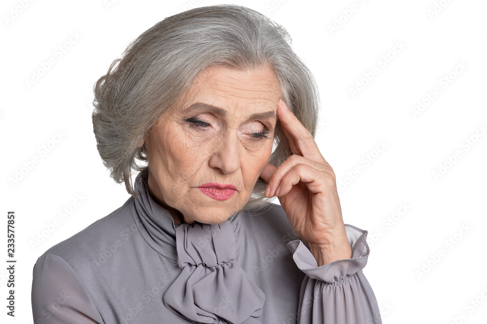 Portrait of sad senior woman on white background Portrait of sad senior woman on white background