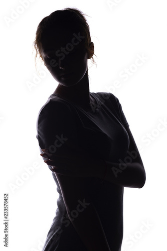silhouette of figure of beautiful girl, woman face on white isolated background, concept of beauty and fashion