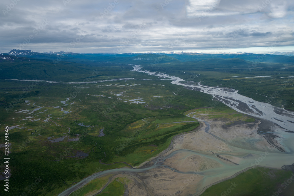 Beautiful aerial view of Katmai National Park. Braided river and untouched wilderness, and mountains in Alaska