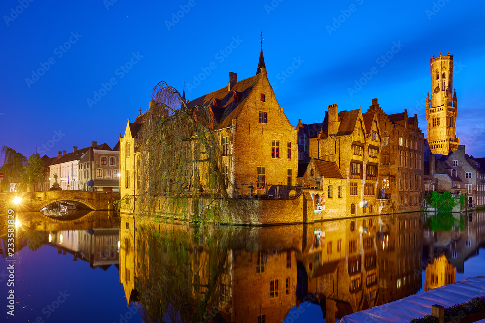 Bruges, Belgium. Evening sunset with blue sky. Water channels