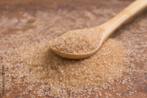 Pile of demerara sugar in a spoon