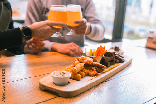 Focused photo on wooden plate that lying on table