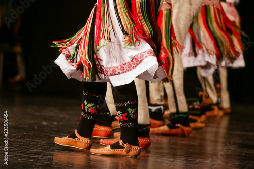 Young Serbian dancers in traditional costume. Folklore of Serbia