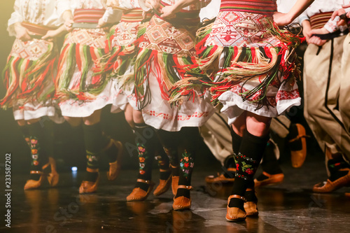 Young Serbian dancers in traditional costume. Folklore of Serbia photo