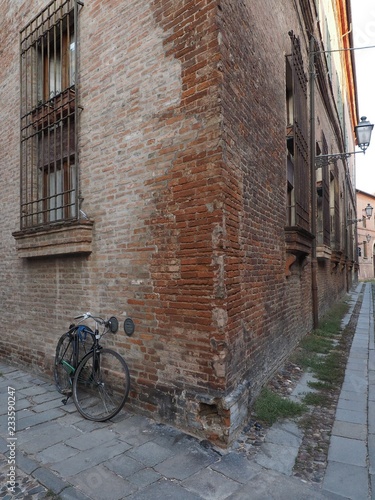 Ferrara  Italy. Medieval zone and broken bike.