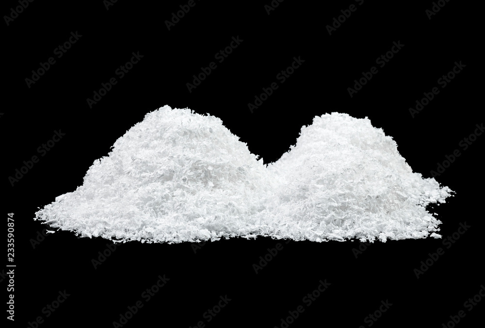 Snow on a black background, closeup. Snow on a black background, closeup.