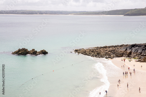 People on beach, England, UK
