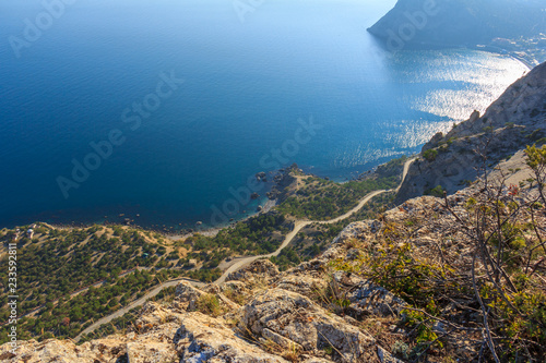 Snake road along the sea from a height © kaa_bregel