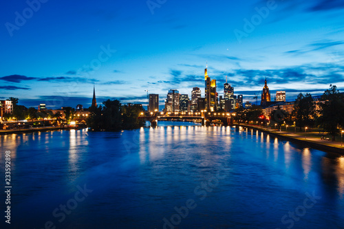 Frankfurt city view from river Main at dusk