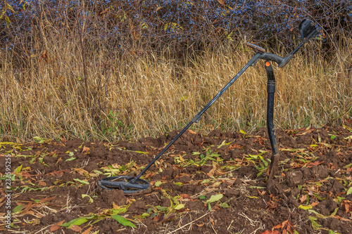 Metal detector and shovel photo