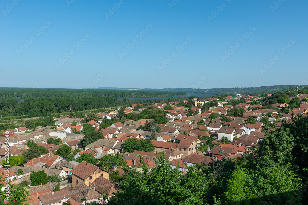 Sremski Karlovci, Serbia - May 2, 2018: Panorama of Sremski Karlovci. Panoramic view of the roofs of the house, Chappel of Peace and Danube river.
