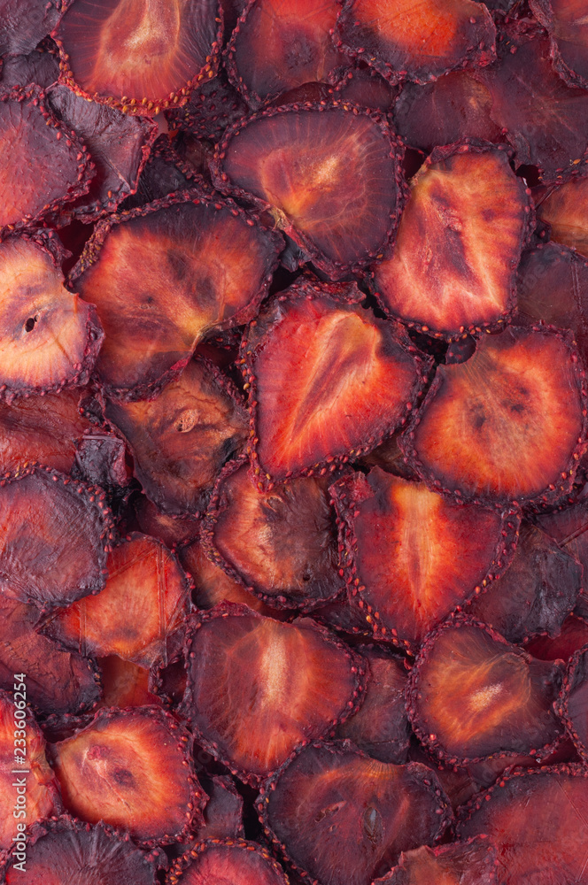 Dried strawberry slices (chips) background. Dried strawberry slices (chips) background.