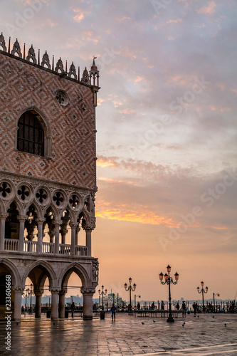 San Marco square in Venice at sunrise with   Doge's Palace, Palazzo Ducale and Saint Mark Column © hungry_herbivore