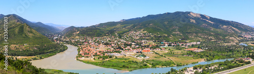 Panoramic view of Mtskheta, The Old Town Lies At The Confluence Of The Rivers Mtkvari And Aragvi. Svetitskhoveli Cathedral, Ancient Georgian Orthodox Church, Unesco Heritage In The Center. © miklyxa