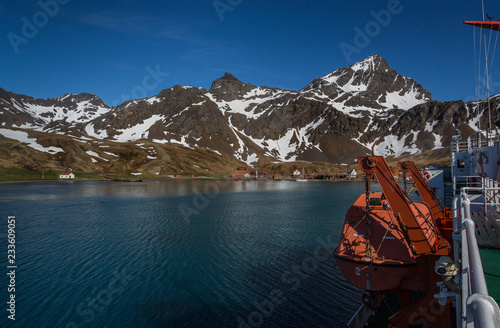 Lifeboat on board a ship in the harbor in front of Grytviken Whaling Station on South Georgia.