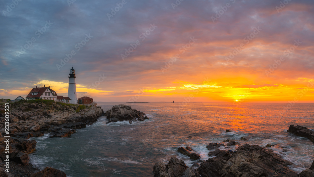 Panorama of Portland Head Lighthouse at sunrise from Cape Elizabeth, Maine 