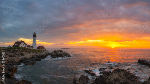 Panorama of Portland Head Lighthouse at sunrise from Cape Elizabeth  Maine 