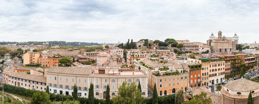 Panorama Cityscape from height, roofs of red tiles and narrow streets of Rome, Italy