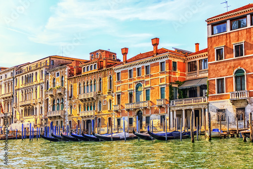 Palaces on the shore of Grand Canal and gondolas rent in Venice