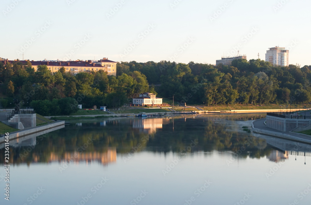 Fototapeta premium water, river, landscape, lake, sky, nature, reflection, city, blue, summer, forest, architecture, trees, travel, view, town, church, pond, panorama, europe, park, house, reflections