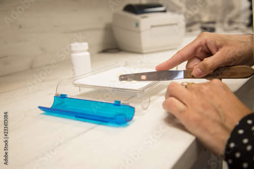 Pharmacist filling prescription