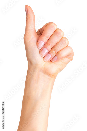 Woman holding hand in gesture of like sign, giving thumb up © Vasyl Onyskiv
