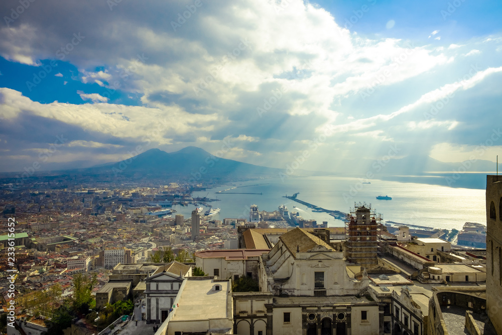 Naples and mount Vesuvius in the background at sunny cloudy day, Italy