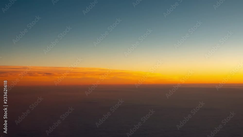 high altitude aerial sunset, glowing orange horizon high altitude aerial sunset, glowing orange horizon