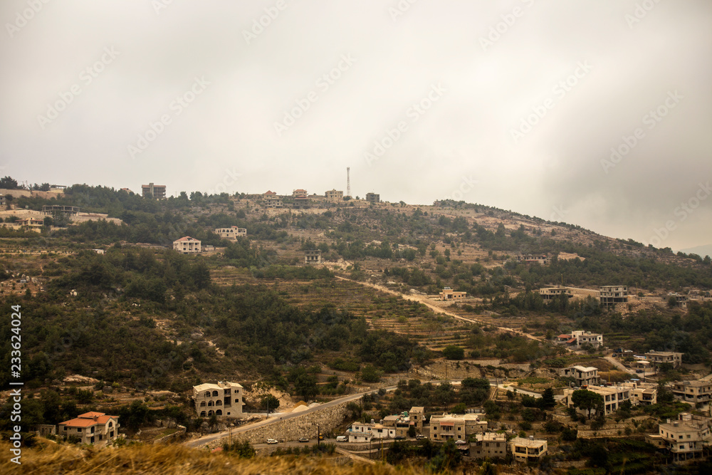 Obraz premium Landscape of Lebanon with mountain villages and vineyards on the hills. Lebanon