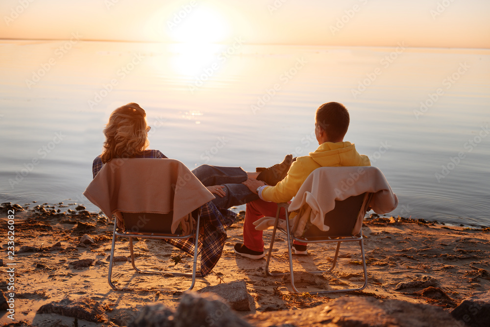 Couple having a date near the river
