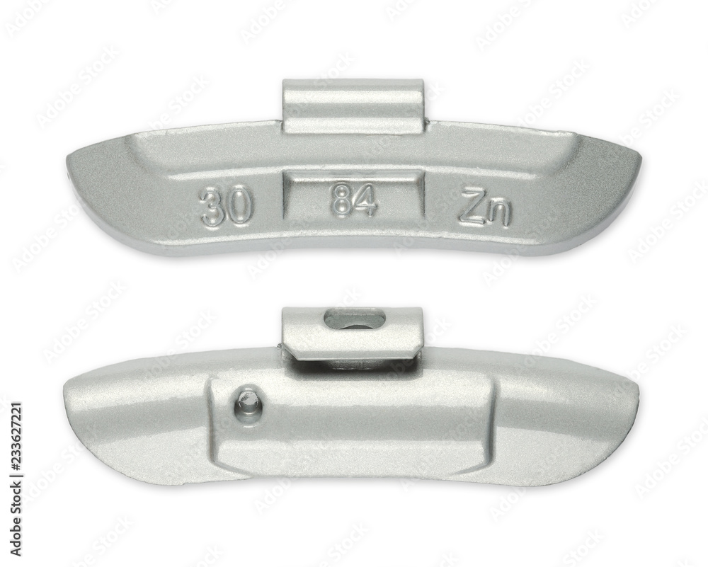 Clip-on zinc tire weight, front and back side, from above. Correction wheel weight, to mount on a rim to create a better mass distribution and balance. Free from lead and environmental friendly. Photo Clip-on zinc tire weight, front and back side, from above. Correction wheel weight, to mount on a rim to create a better mass distribution and balance. Free from lead and environmental friendly. Photo