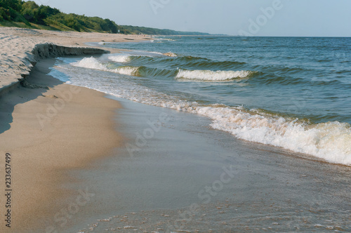 Sea coast. Waves and storms at sea. Waves on the Baltic Sea.