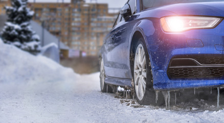 starting engine and warming up the icy car in severe frosts in winter