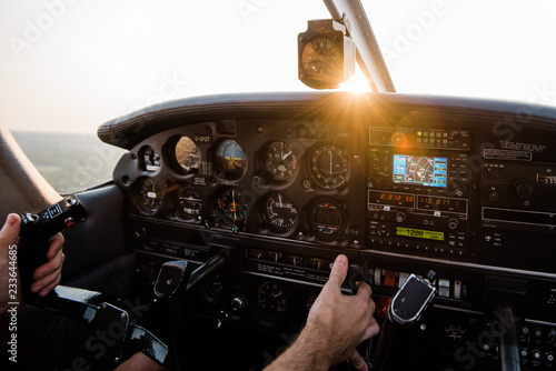 Aircraft cockpit at sunset photo