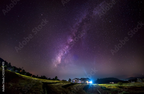 The Milky Way galaxy on the rice field on the mountain.Long exposure photograph, with grain.Image contain certain grain or noise and soft focus. 