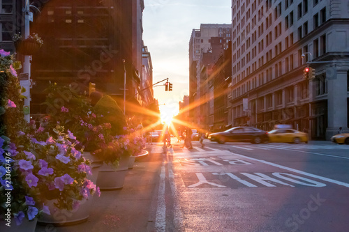 Colorful New York City street scene with flowers and sunset
