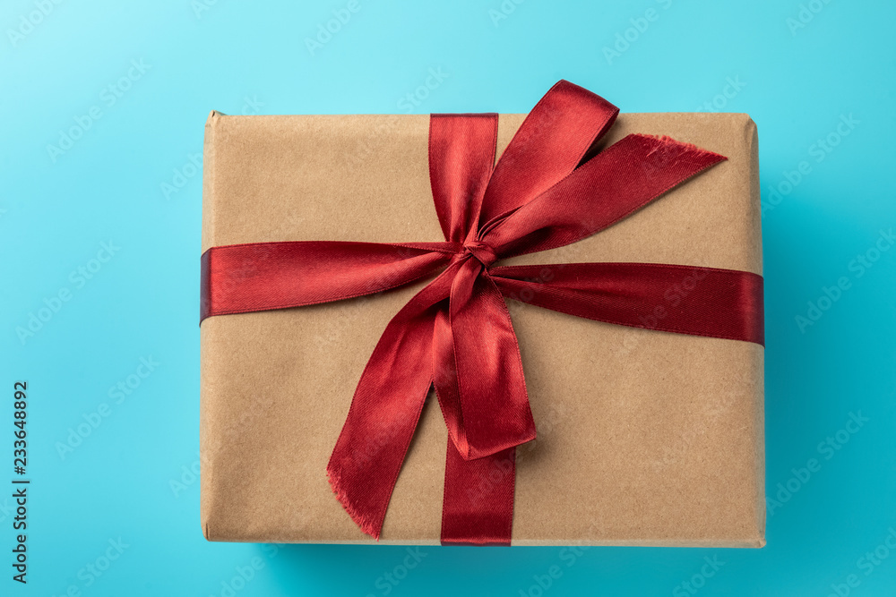 Flat lay of gift on blue background Flat lay of gift on blue background