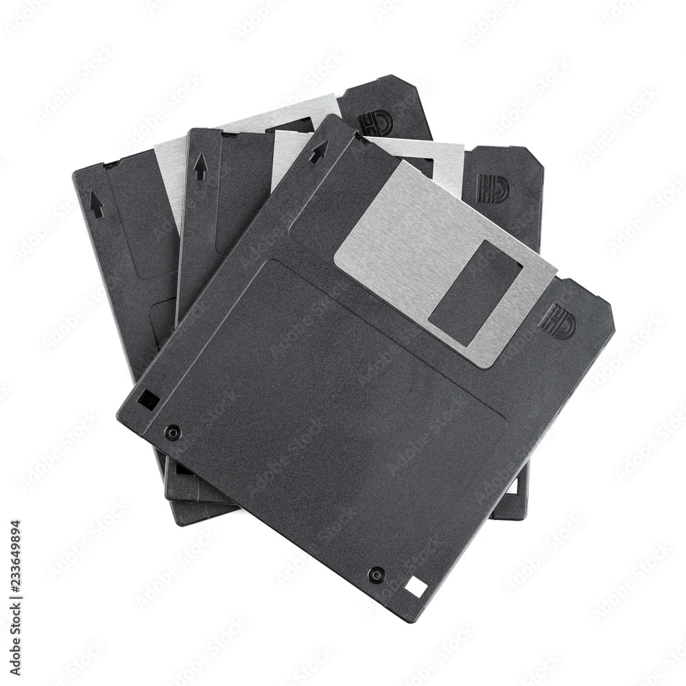 Old computer diskette over white background. Black Diskette. Old computer diskette over white background. Black Diskette.