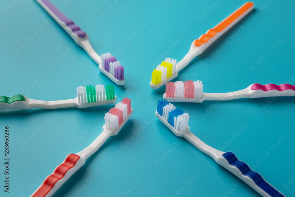 toothbrushes in the form of a star on a blue background toothbrushes in the form of a star on a blue background